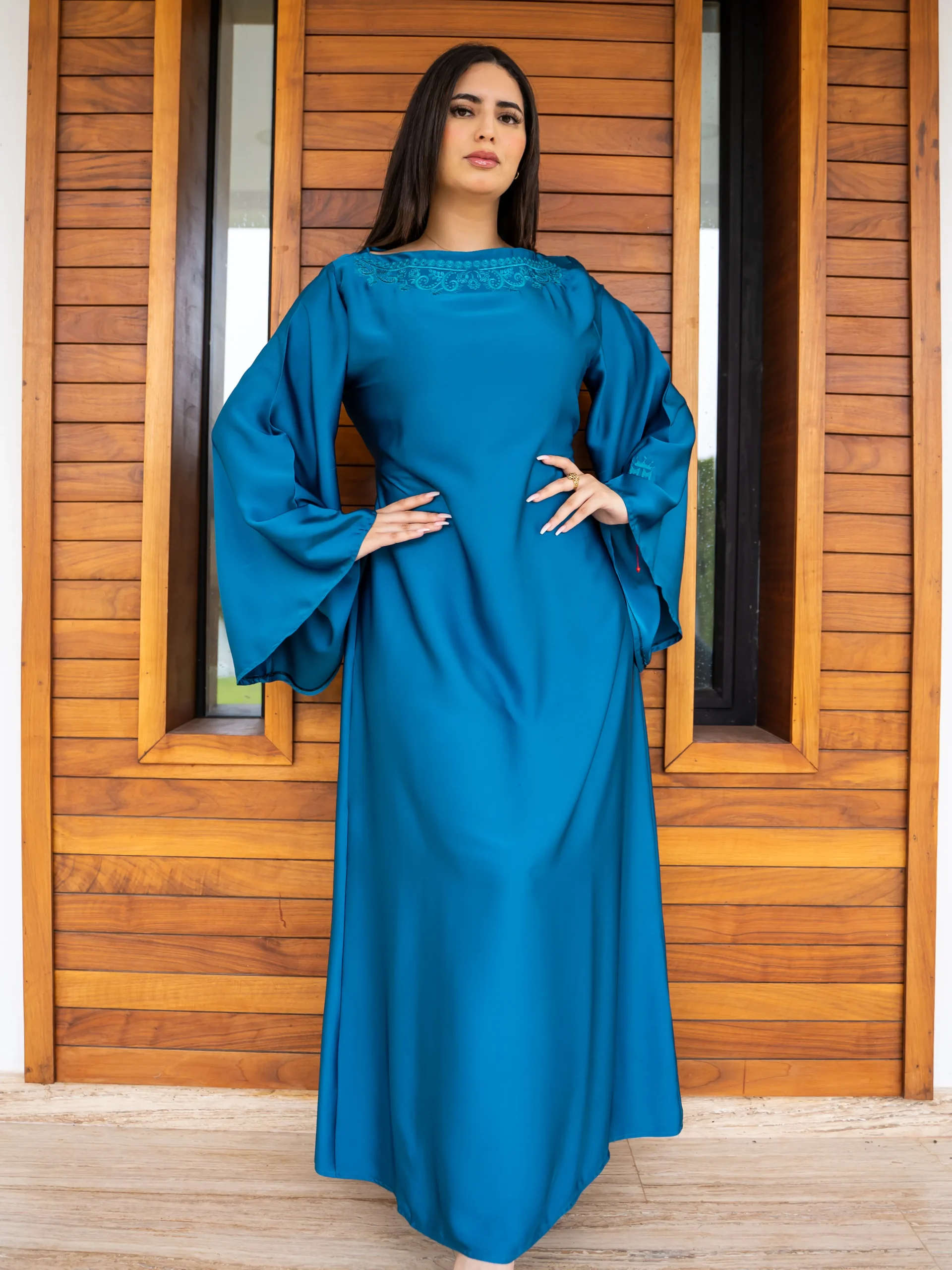 teal embroidered kaftan with wide flowing sleeves