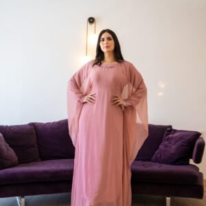 blush pink flowing kaftan dress with wide sleeves